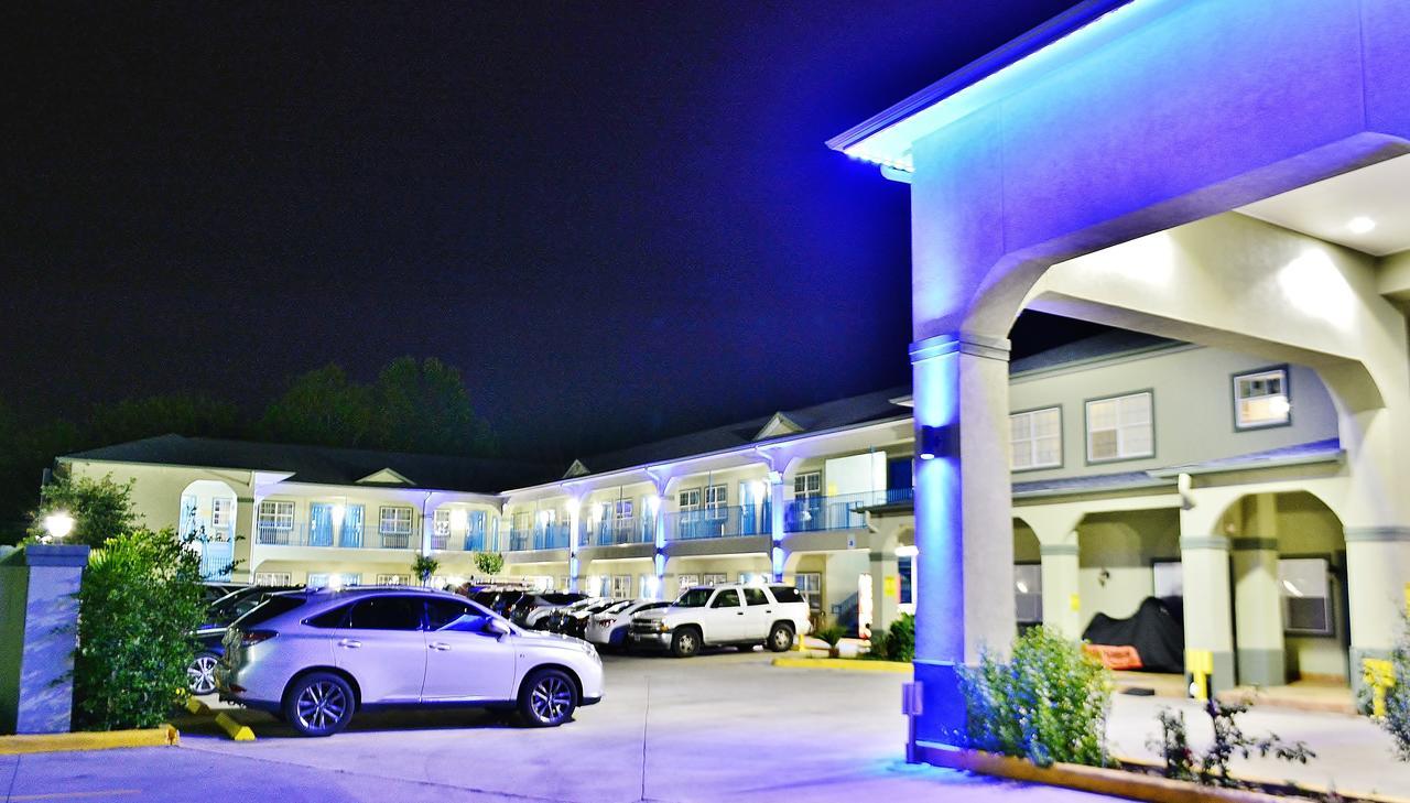 Scottish Inn And Suites Alvin Buitenkant foto